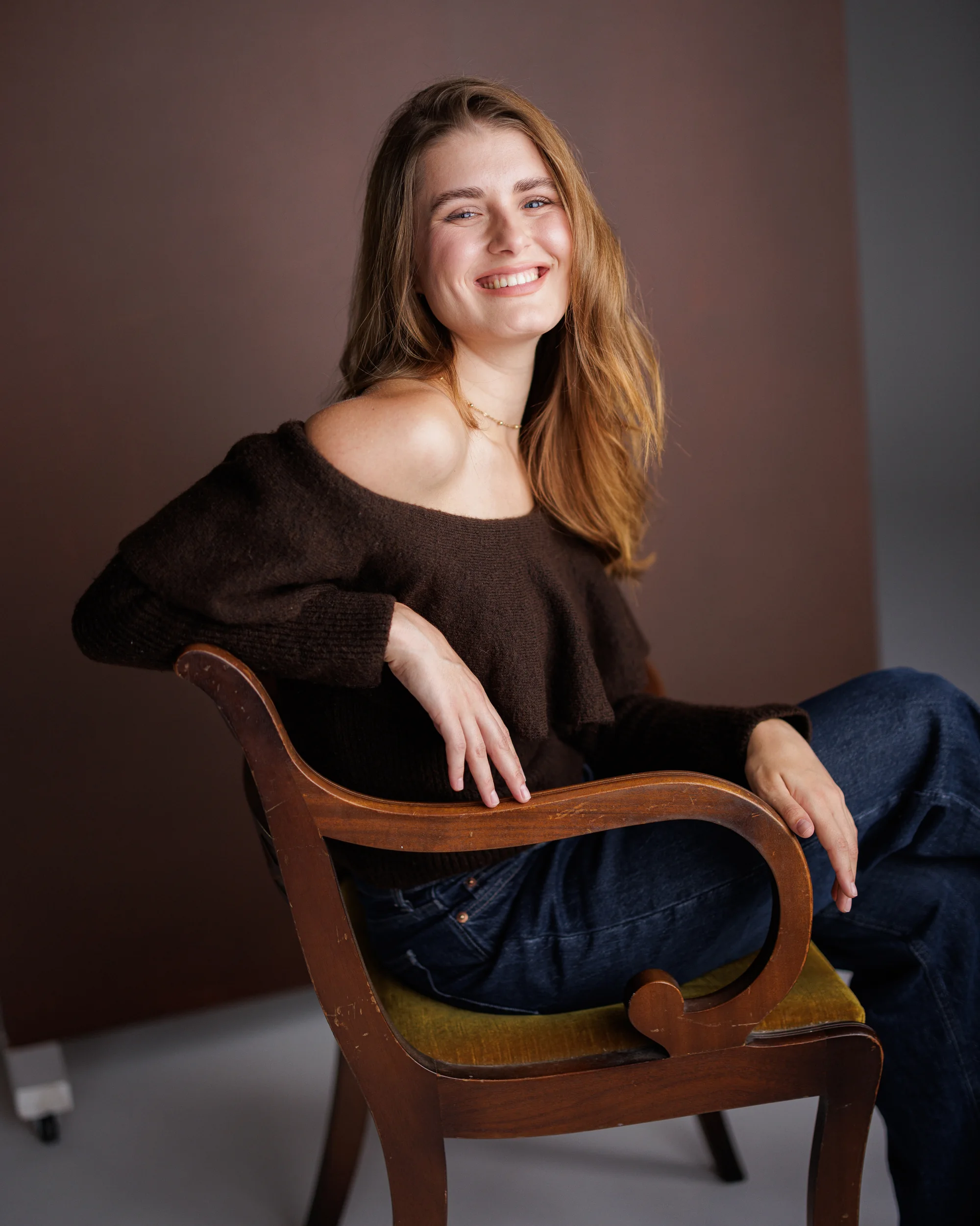Radhica Isac smiling in a relaxed lifestyle portrait
